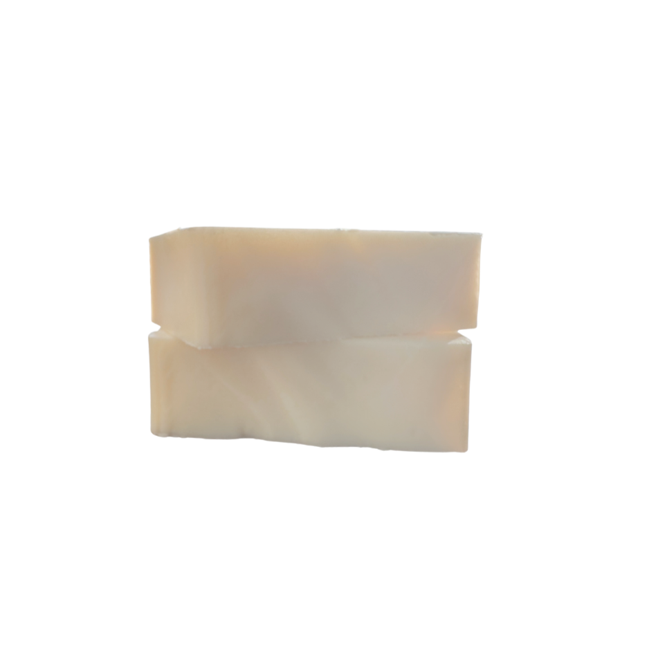 Two creamy beige tallow soap bars stacked on a white background